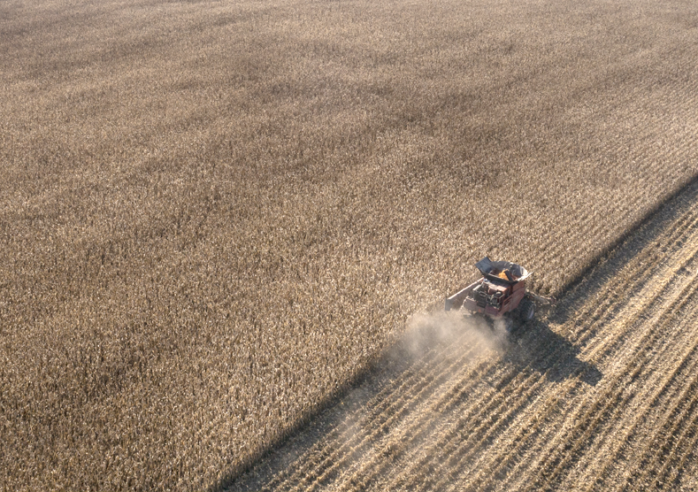 Harvester in a field